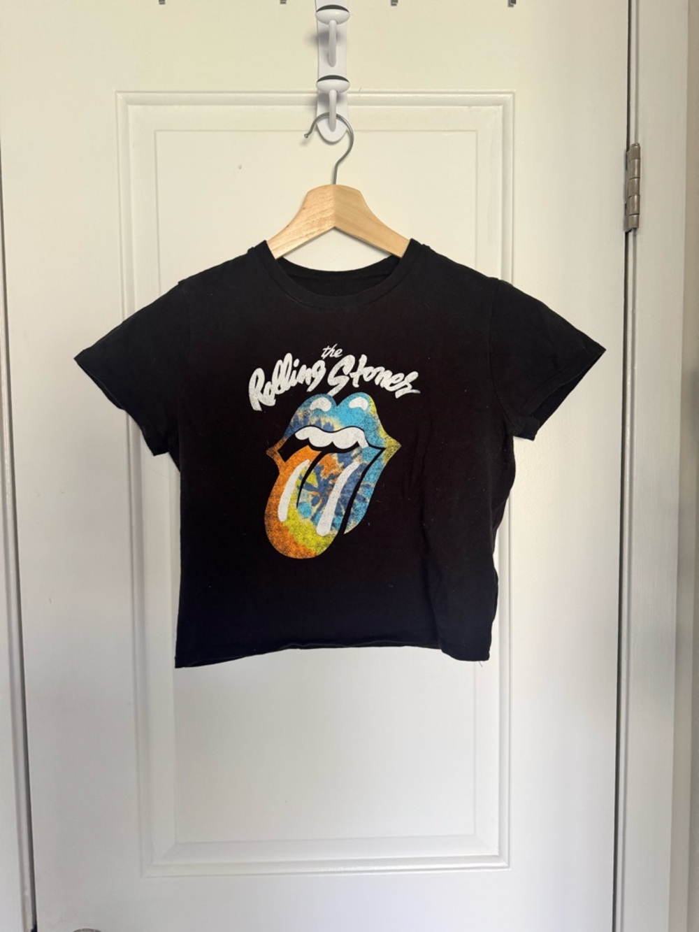 the Rolling Stones Black Tee with White Logo and Blue Accent